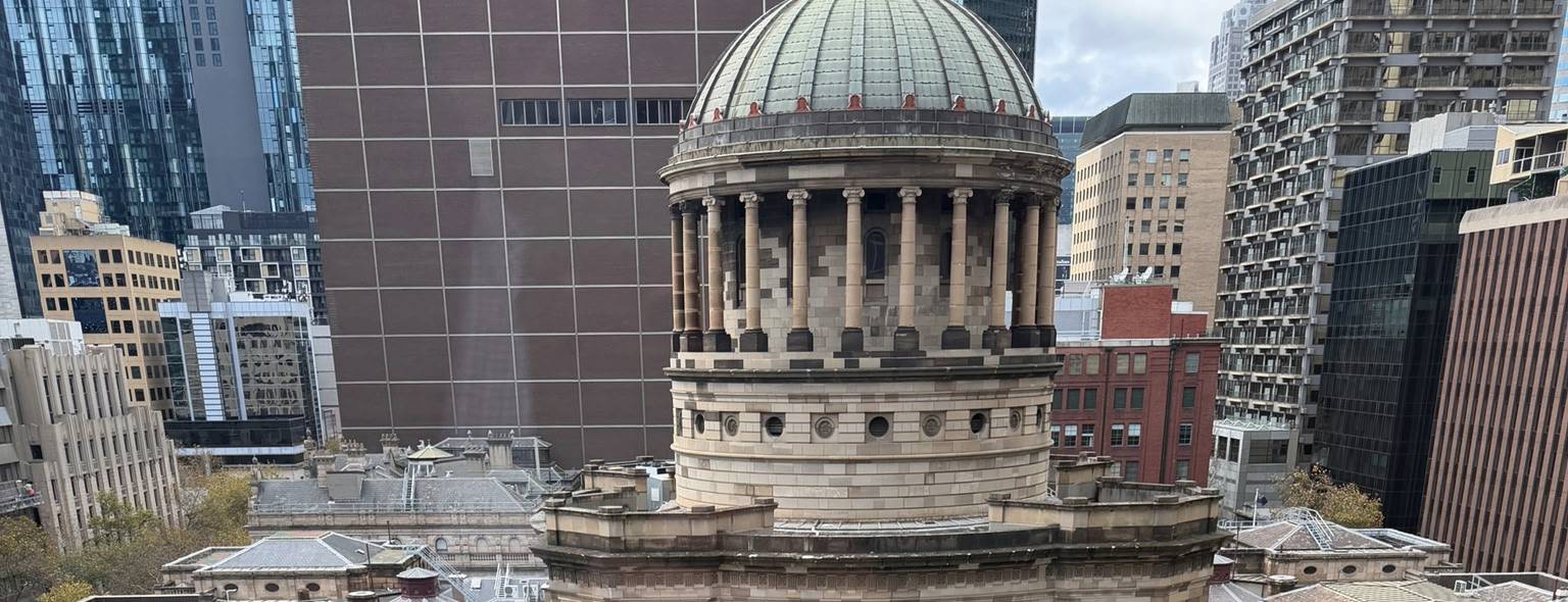 The dome of the Supreme Court of Victoria on William Street, seen from Christopher Sheen's chambers at Owen Dixon Chambers East